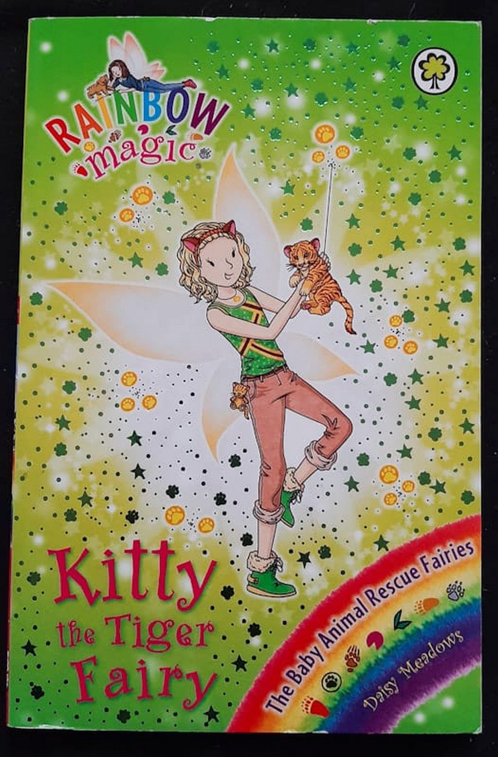 Front Cover Of Bestselling Book Kitty The Tiger Fairy (The Animal Rescue Fairies #2) (Daisy Meadows
)
