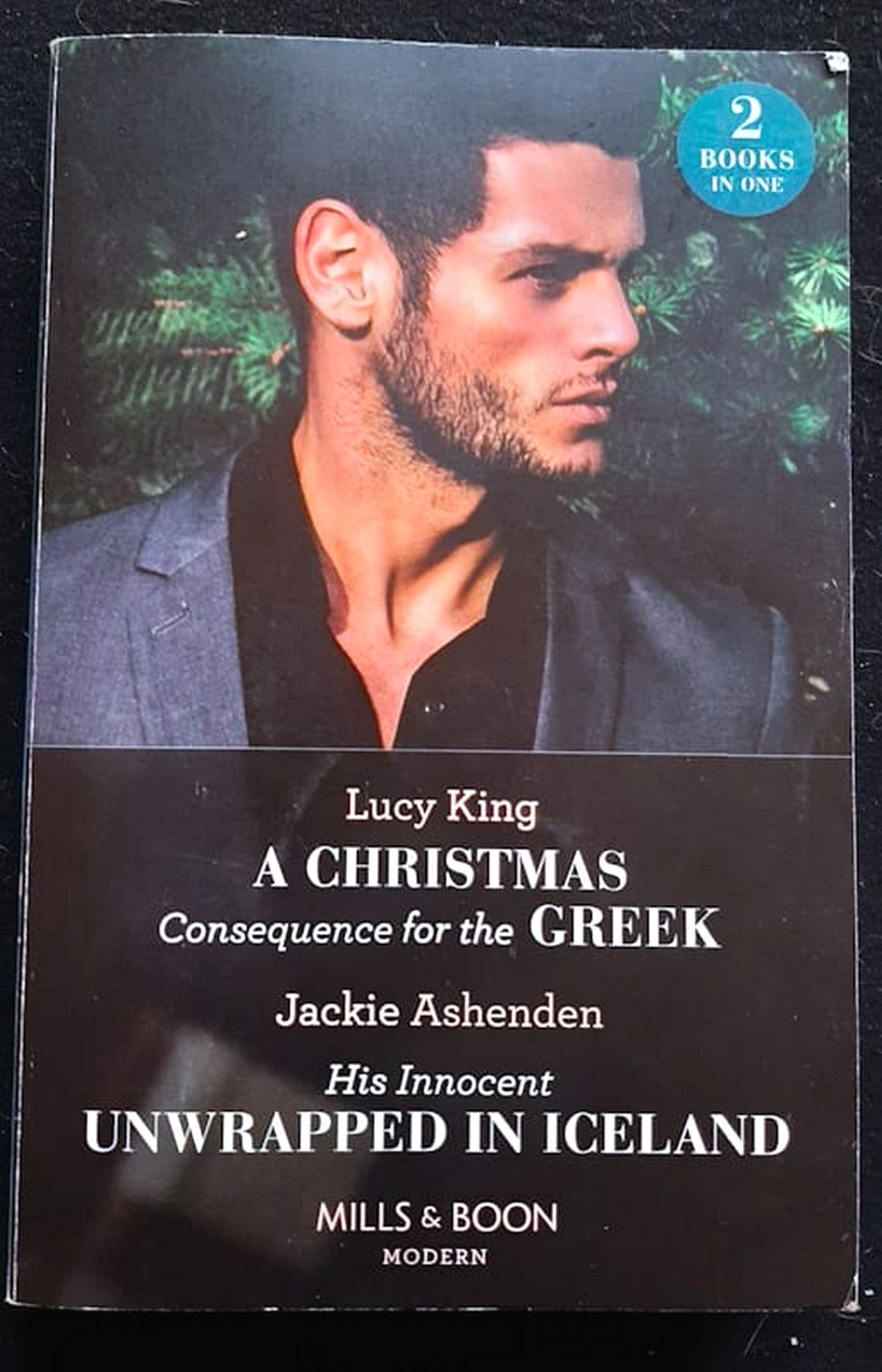 Front Cover Of Bestselling Book A Christmas Consequence For The Greek / His Innocent Unwrapped In Iceland (Jackie Ashenden, Lucy King
)