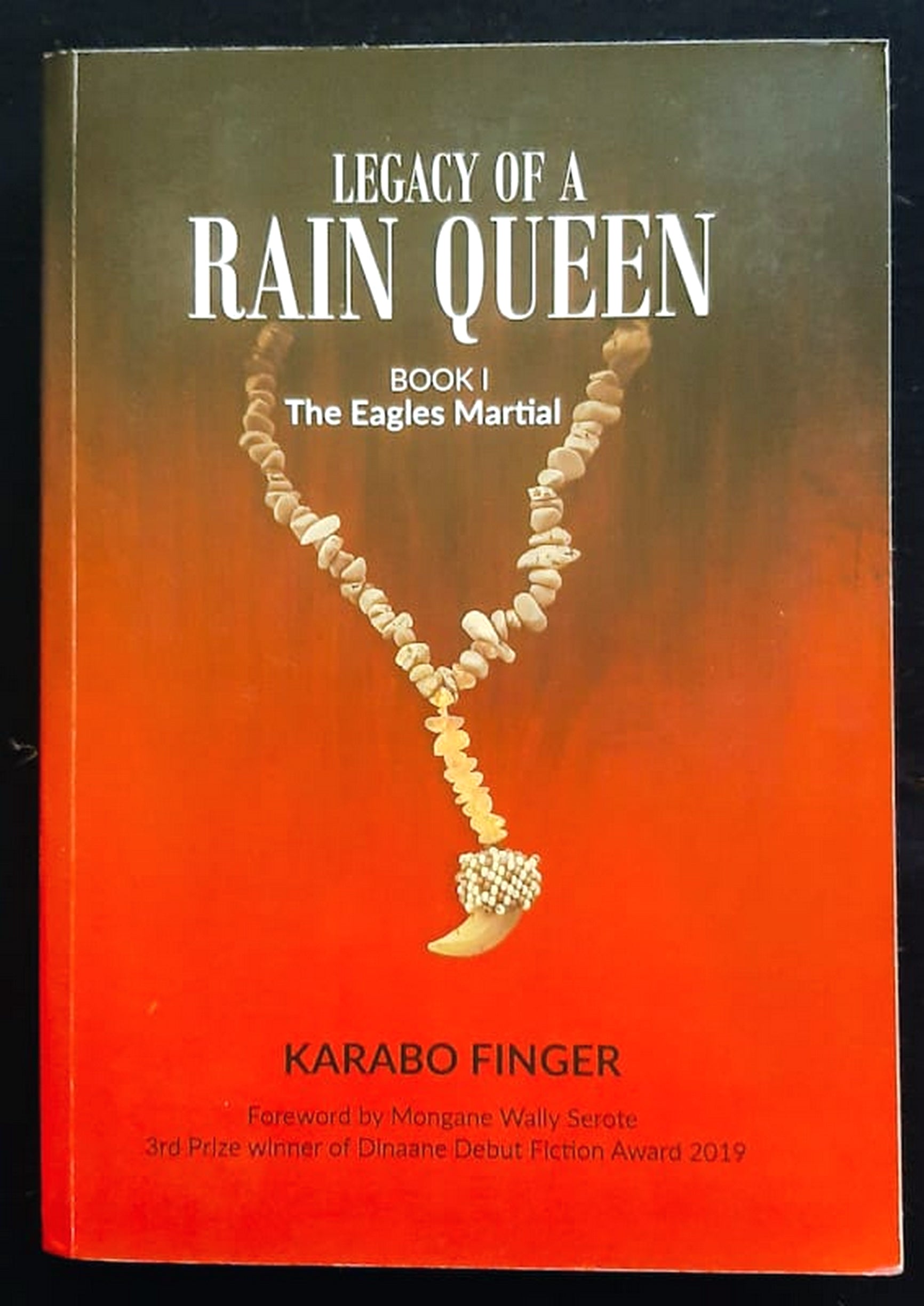 Front Cover Of Bestselling Book Legacy Of A Rain Queen -The Eagles Martial (Karabo Finger
)
