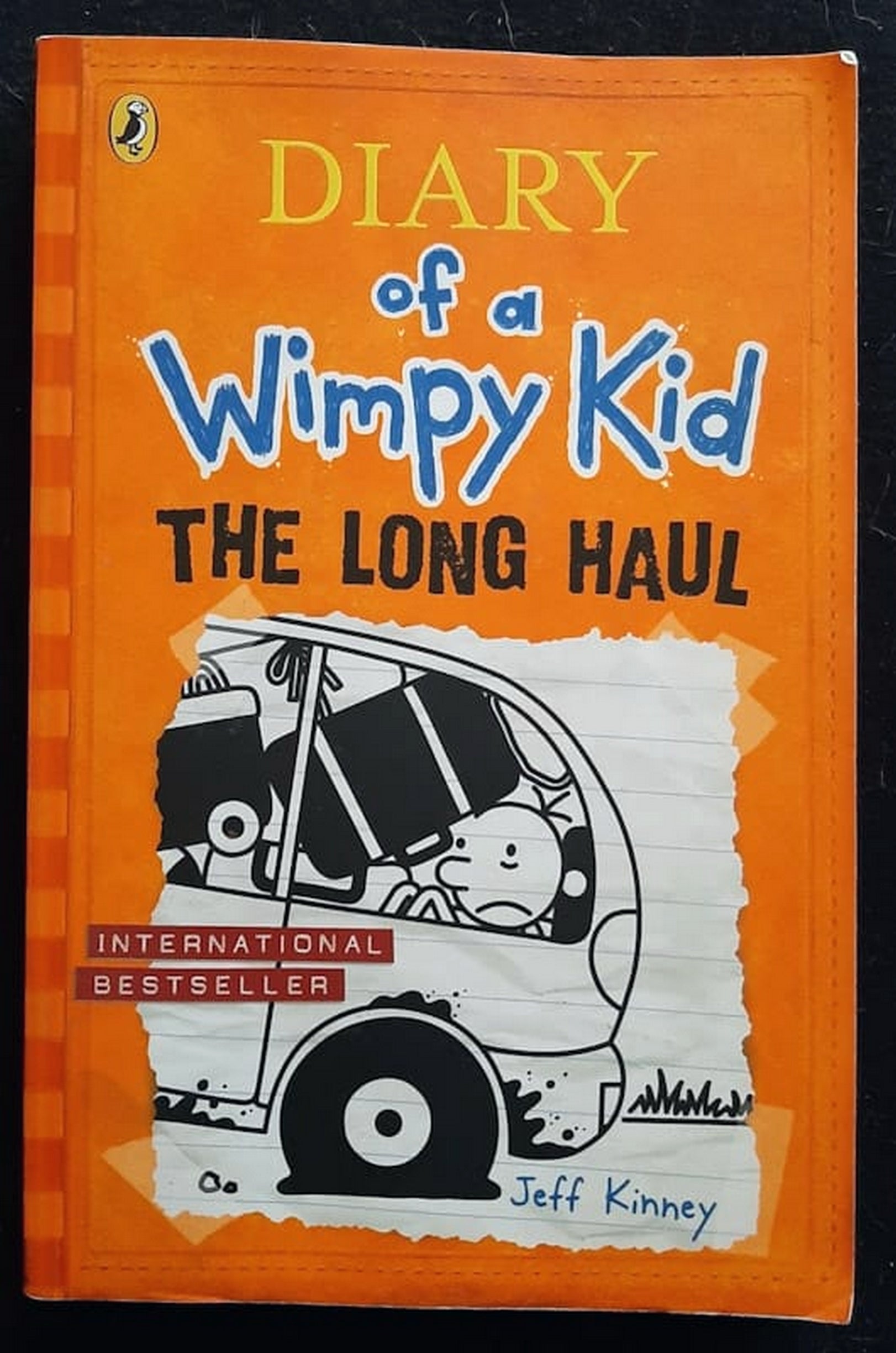 Front Cover Of Bestselling Book The Long Haul (Diary Of A Wimpy Kid #9) (Jeff Kinney
)