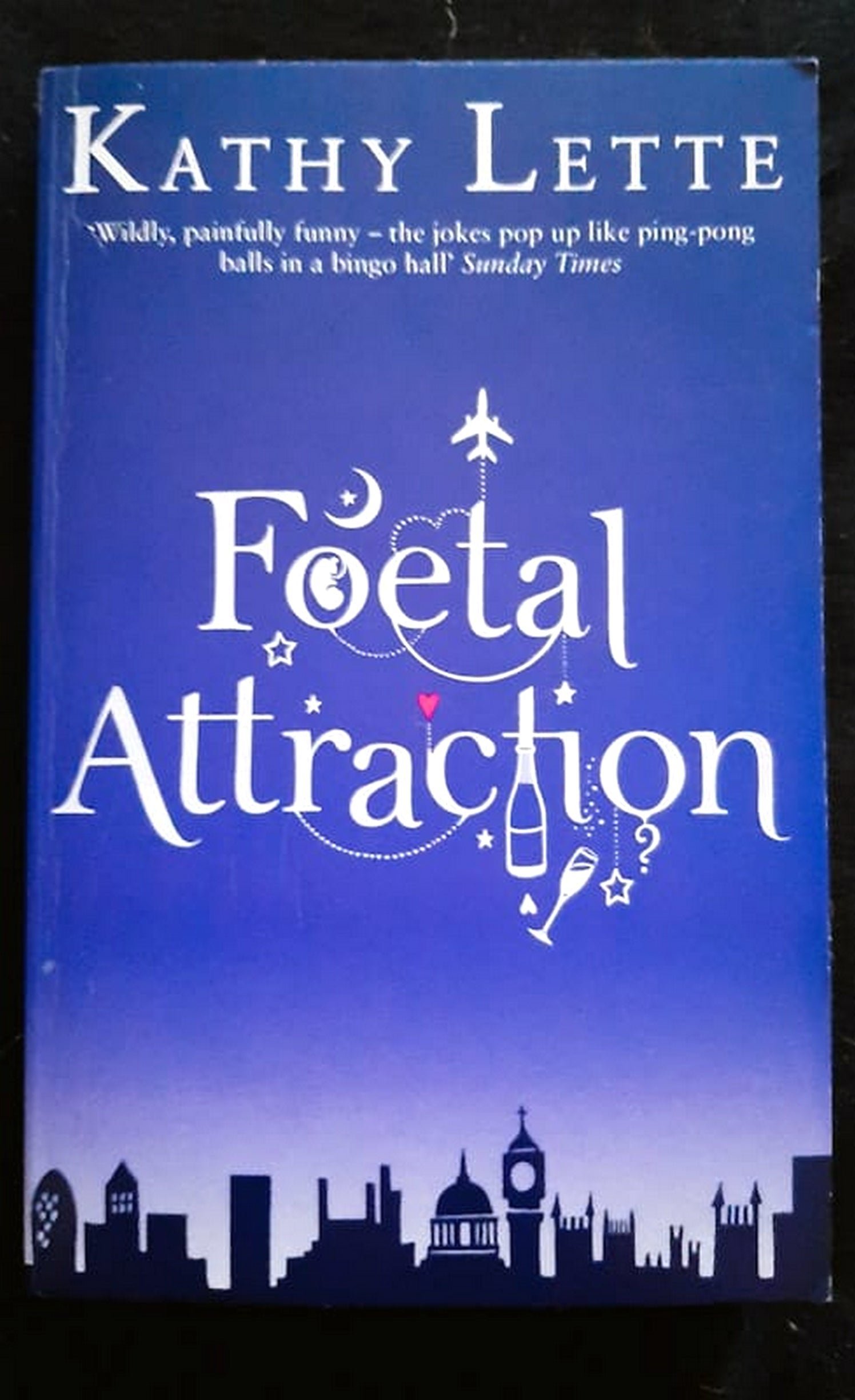 Front Cover Of Bestselling Book Foetal Attraction (Madeleine Wolfe #1) (Kathy Lette
)