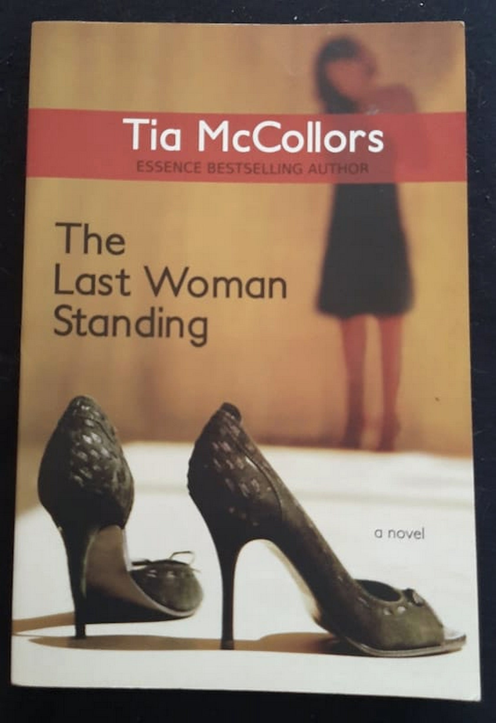 Front Cover Of Bestselling Book The Last Woman Standing (Tia Mccollors
)