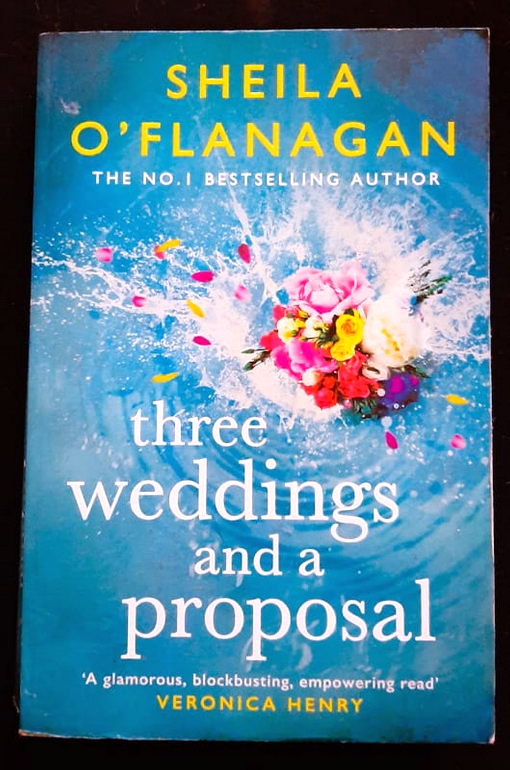 Front Cover Of Bestselling Book Three Weddings And A Proposal (Sheila O'Flanagan
)