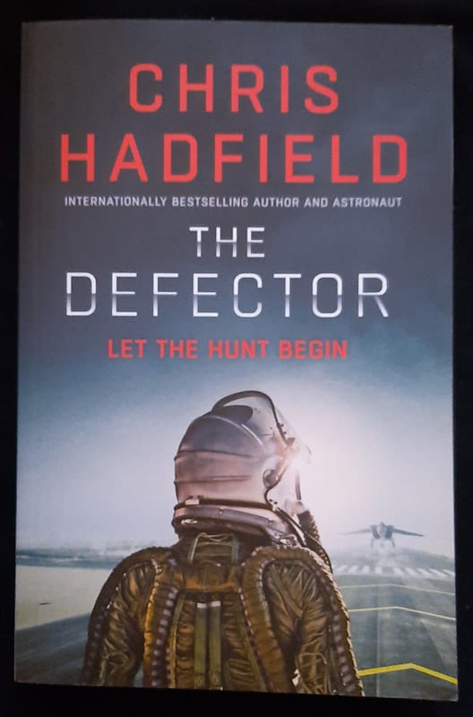 Front of cover of The Defector (Apollo Murders #2) (Chris Hadfield)