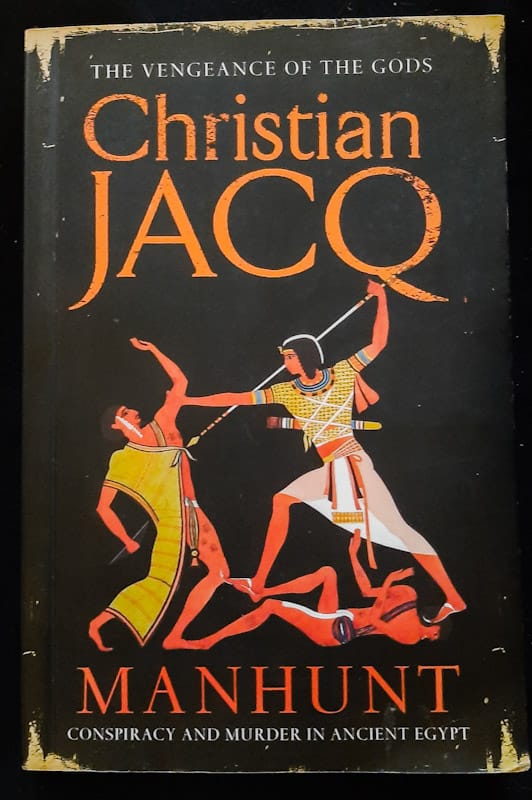 Front of cover of Manhunt (La Vengeance Des Dieux #1) (Christian Jacq)