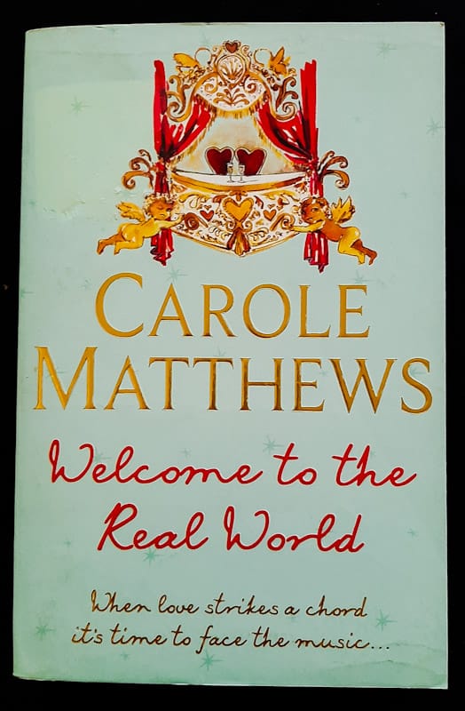 Front of cover of Welcome To The Real World (Carole Matthews)