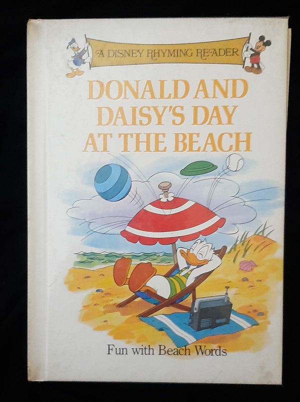 Front Cover Of A Disney Rhyming Reader: Donald and daisy's day at the beach