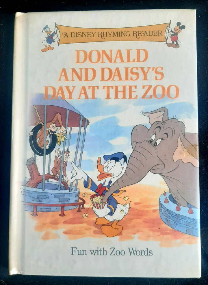 Front Cover Of A Disney Rhyming Reader: Donald and daisy's day at the zoo