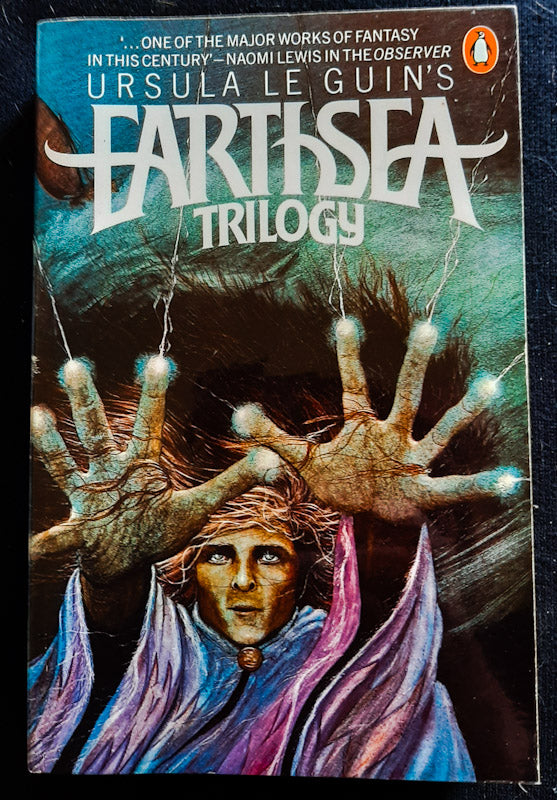 Front Cover Of The Earthsea Trilogy (Earthsea Cycle #1-3) (Ursula K. Le Guin
)