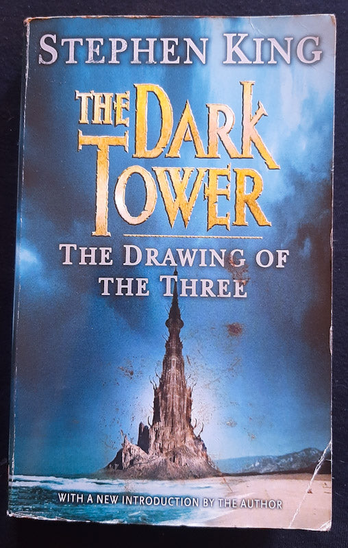 Front Cover Of The Drawing of the Three (The Dark Tower #2) (Stephen King)