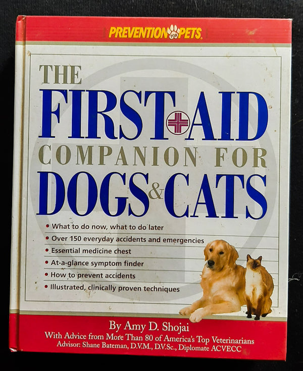 Front Cover Of The First-Aid Companion For Dogs & Cats (Prevention Pets) (Dr Amy D. Shojai
)