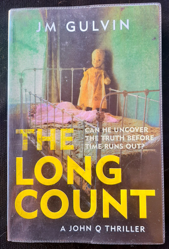 Front Cover Of The Long Count: A John Q Mystery (John Q #1) (JM Gulvin
))