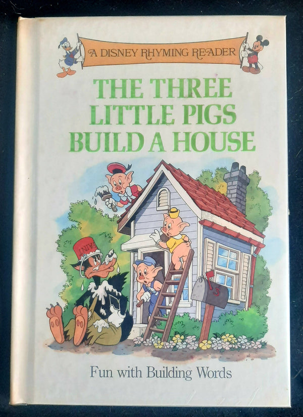 Front Cover Of A Disney Rhyming Reader: The three little pigs build a house