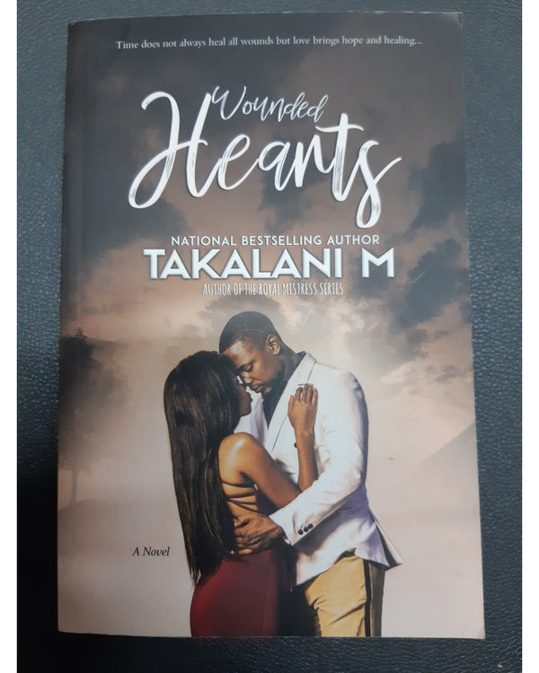 Front Cover Of Wounded Hearts (Takalani M.))