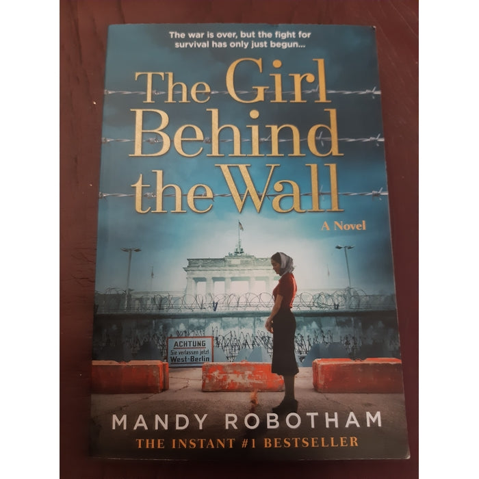 Front Cover Of The Girl Behind the Wall (Mandy Robotham))