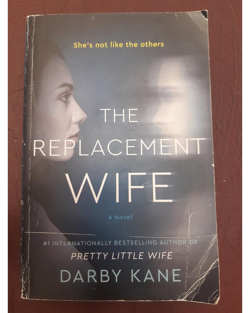 Front Cover Of The Best-Selling Book The Replacement Wife: A Novel Darby Kane